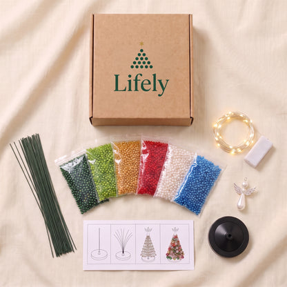 Beaded tree kit contents: sorted beads, wires, lights, angel topper, base and guide